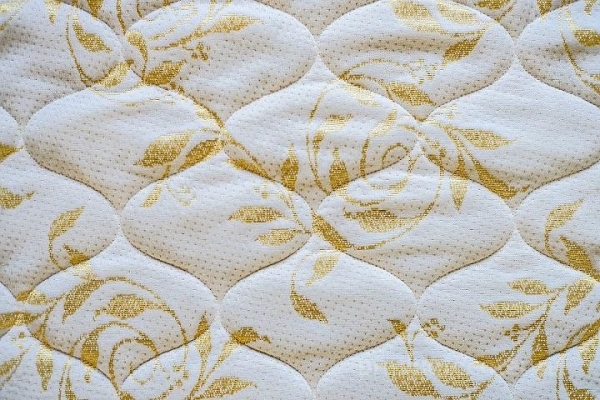 Услуги стегания на давальческом сырье с ниткой